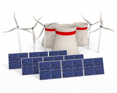 Multiple solar panels with windmill stock photo