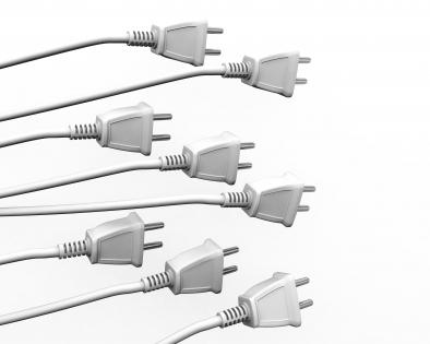 Multiple white plugs showing business team concept stock photo