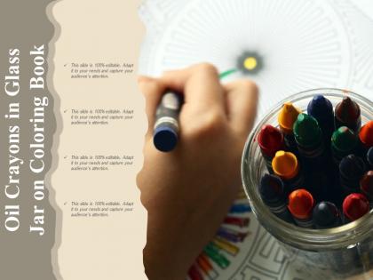 Oil crayons in glass jar on coloring book