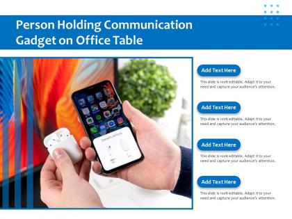 Person holding communication gadget on office table