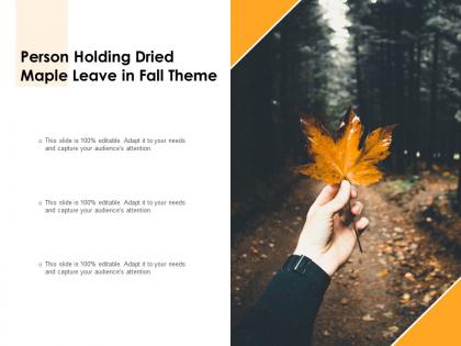 Person holding dried maple leave in fall theme