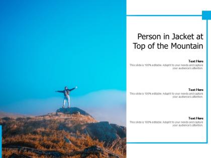 Person in jacket at top of the mountain