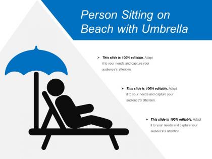Person sitting on beach with umbrella