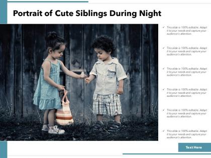 Portrait of cute siblings during night