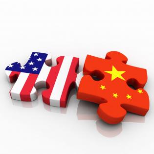 Puzzle pieces with american and chinese flag design stock photo