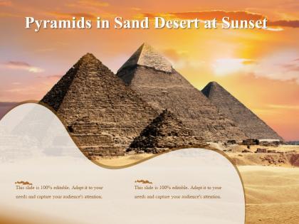 Pyramids in sand desert at sunset