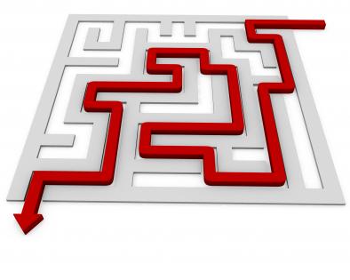 Red arrow for solution path in maze stock photo