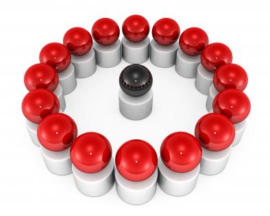 Red spheres in circle with one black sphere as leader stock photo