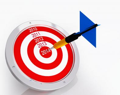 Red target dart with one blue arrow stock photo