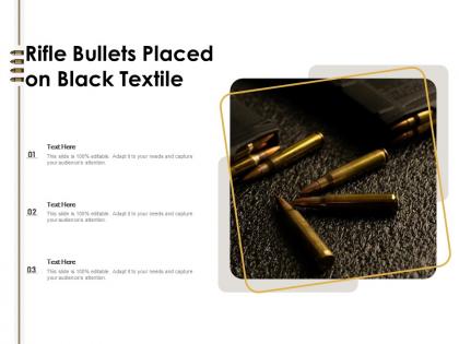 Rifle bullets placed on black textile
