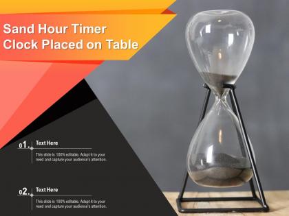 Sand hour timer clock placed on table