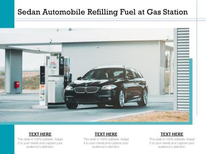 Sedan automobile refilling fuel at gas station