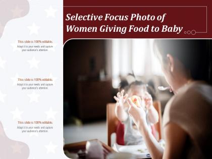 Selective focus photo of women giving food to baby