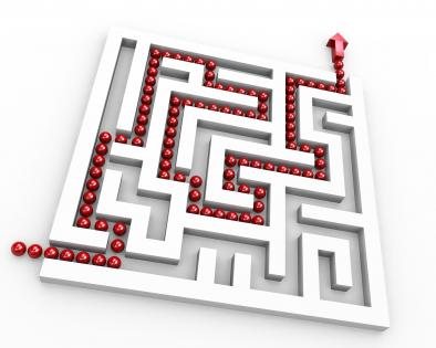 Square maze with red way arrow for showing solution path stock photo