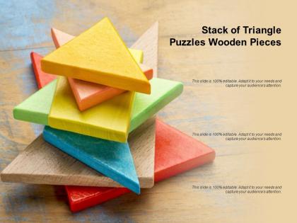 Stack of triangle puzzles wooden pieces