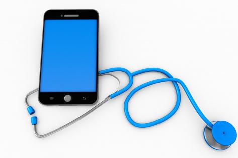 Stethoscope with smartphone showing concept of medical stock photo