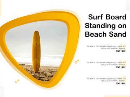 Surf board standing on beach sand