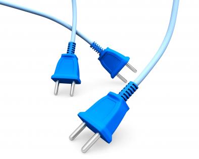 Three blue colored electronic plugs on white background stock photo