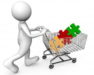 Three colored puzzle in cart with 3d man stock photo