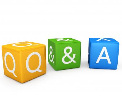 Three cubes with quality and assurance stock photo