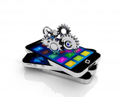 Three mobiles with silver gears stock photo