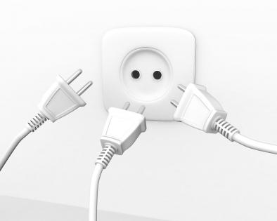 Three plugs for electricity socket to show teamwork stock photo