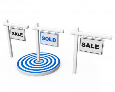 Three sign post with sale text with blue target stock photo