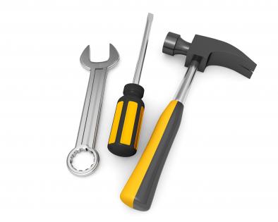 Tools like wrench screwdriver hammer on white background stock photo