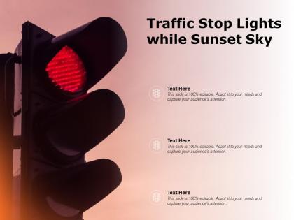 Traffic stop lights while sunset sky