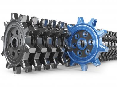 Unique blue gear in black gears stock photo