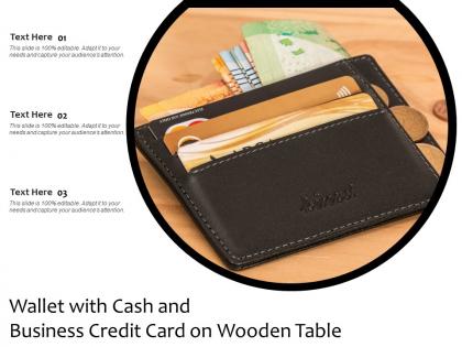 Wallet with cash and business credit card on wooden table