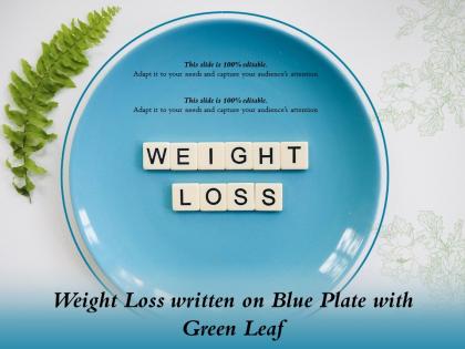 Weight loss written on blue plate with green leaf