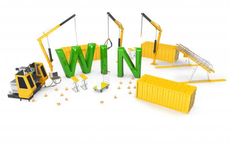 Win text three cranes in background stock photo