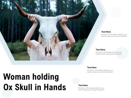 Woman holding ox skull in hands