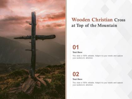 Wooden christian cross at top of the mountain