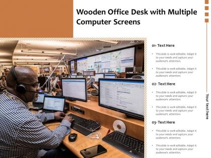 Wooden office desk with multiple computer screens