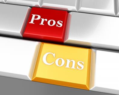 Words of pros and cons on a keyboard stock photo