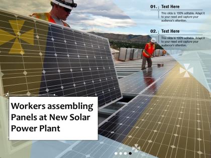 Workers assembling panels at new solar power plant