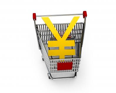 Yen symbol in shopping cart for marketing and sales stock photo