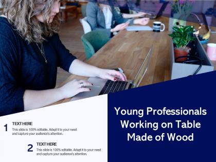Young professionals working on table made of wood